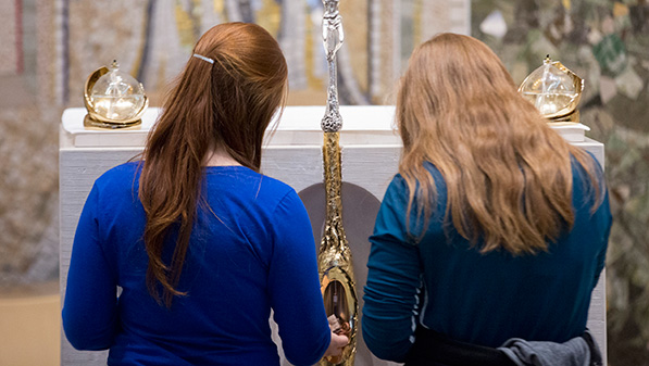 Pilgrims venerate the blood relic at the Luminous Mysteries Chapel